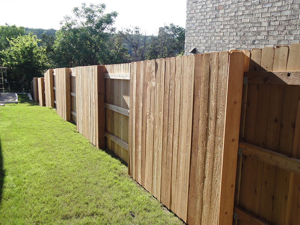 Alternating wooden fence sections