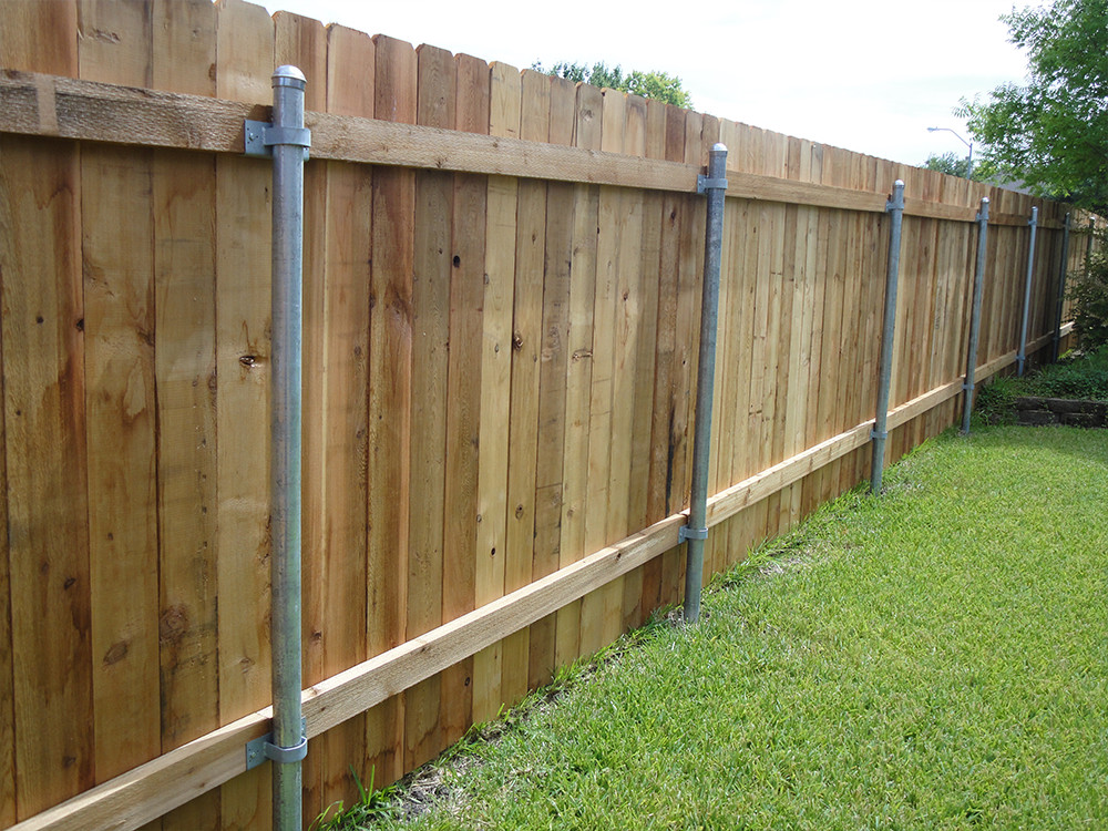 Wooden fence with steel posts