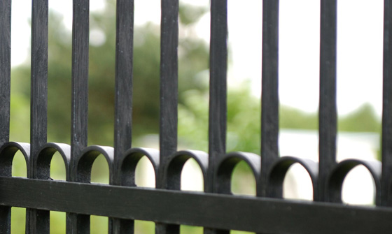 Close up section of wrought iron fence