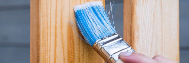 Painting a wooden fence