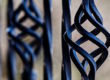 A wrought iron fence.