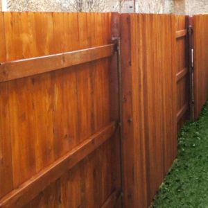 dark stained wood fence