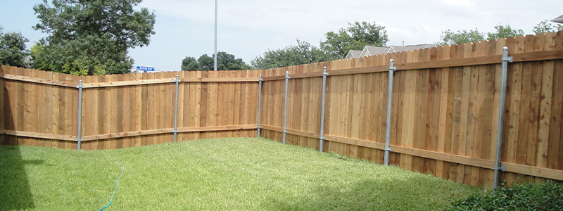 fenced backyard in lakeway